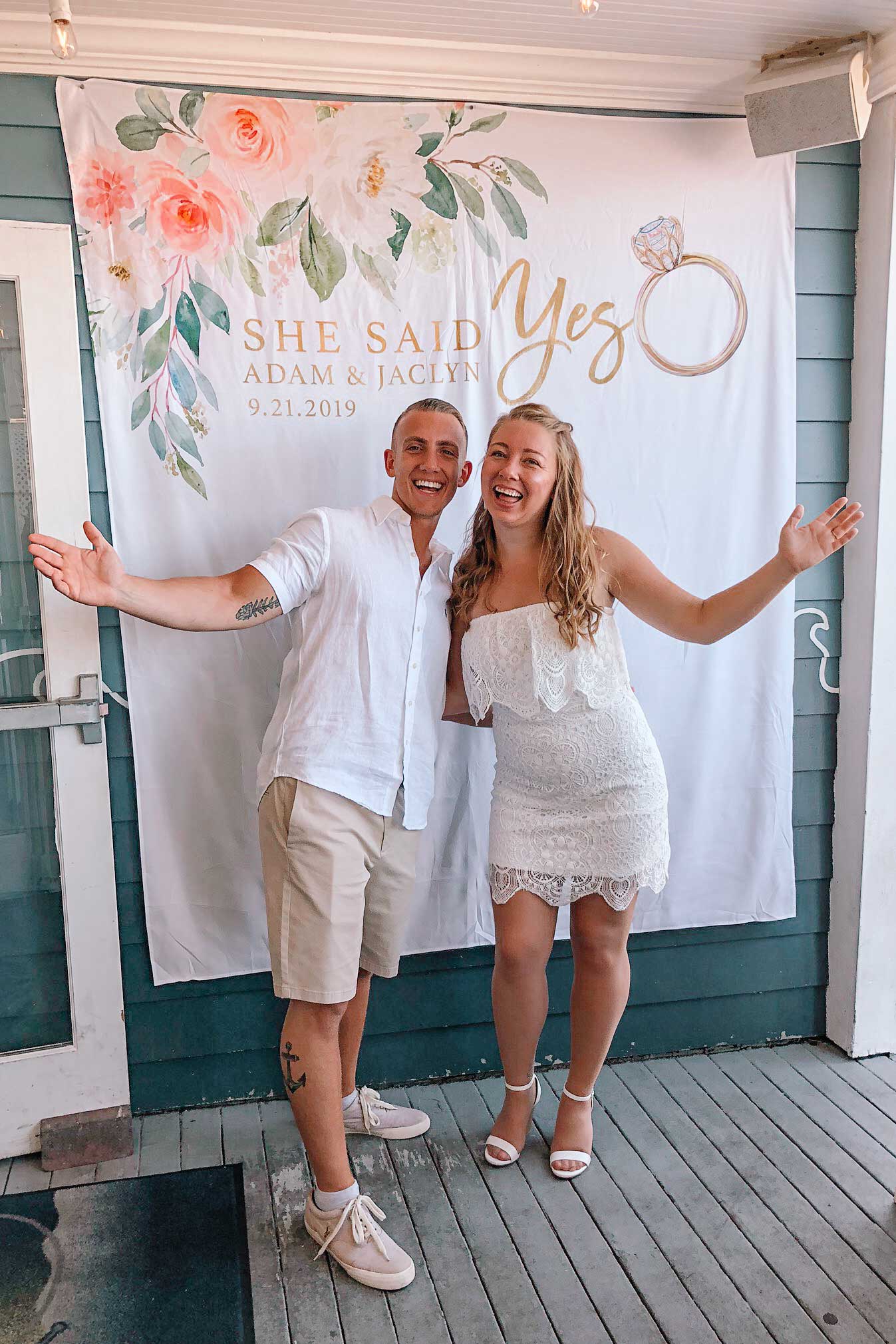 backyard engagement party photo booth decorations